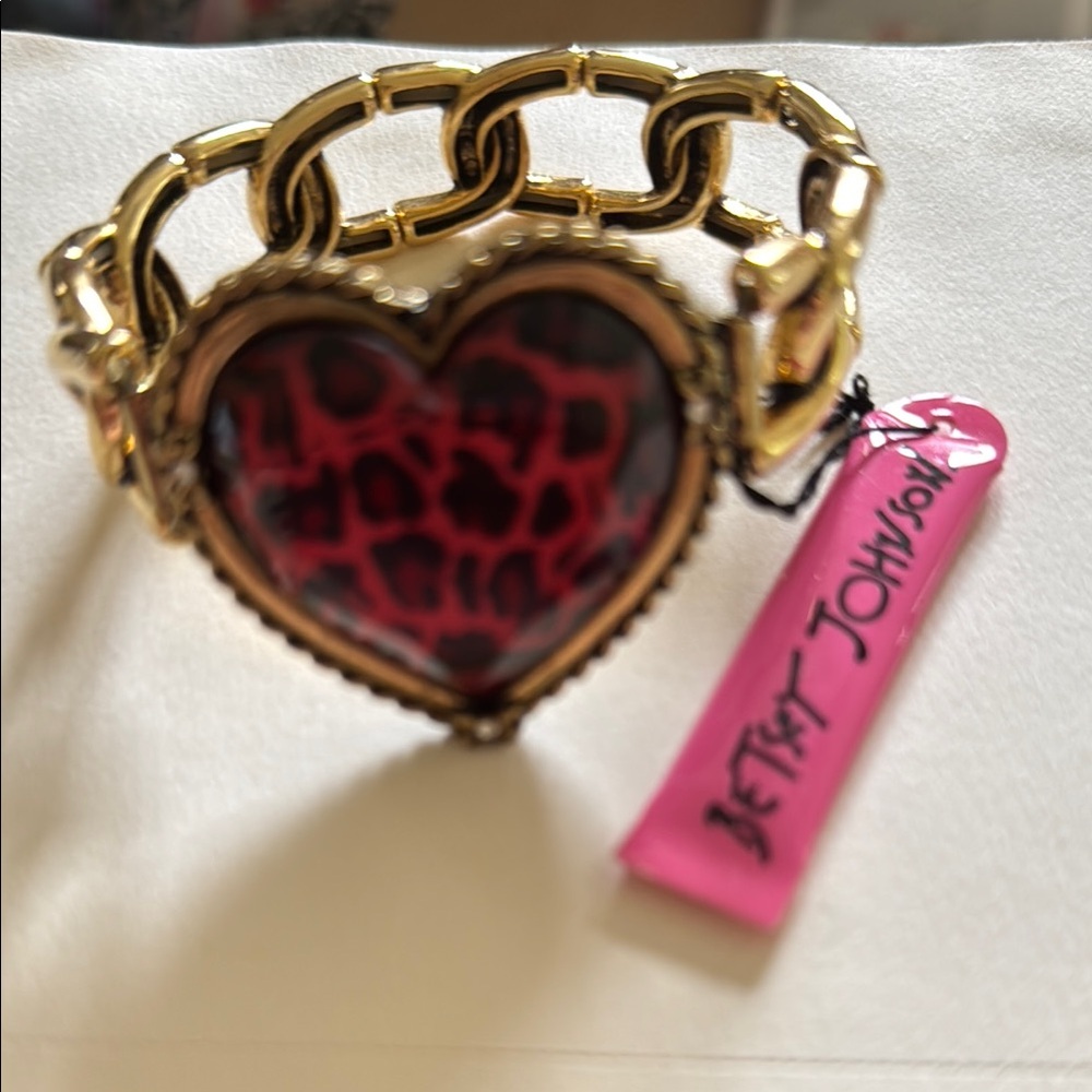Brand new Betsey Johnson Gold Bracelet with Red Leopard Heart